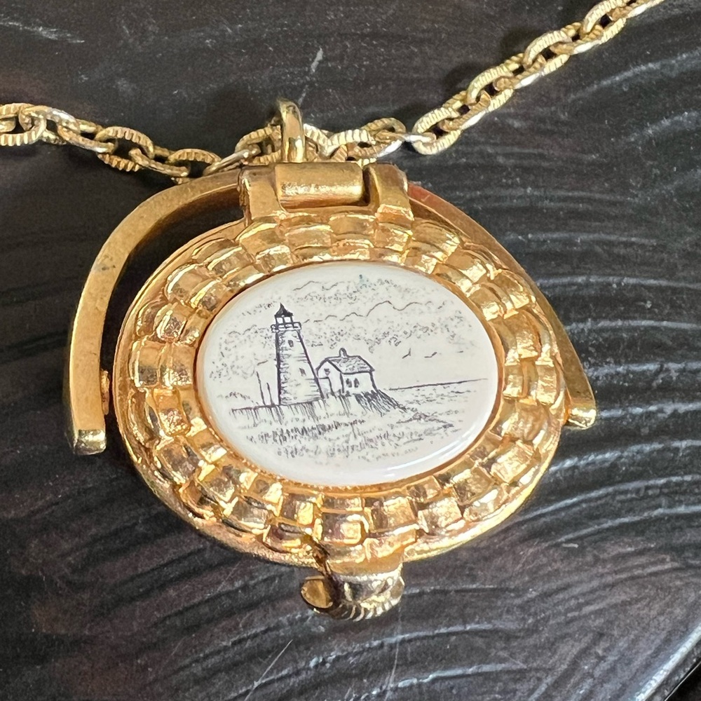 Gold Pendant Necklace with Lighthouse Design